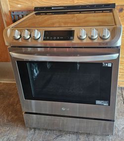 LG STAINLESS STEEL SLIDE IN GLASSTOP INDUCTION STOVE CONVECTION OVEN.....$ 430
