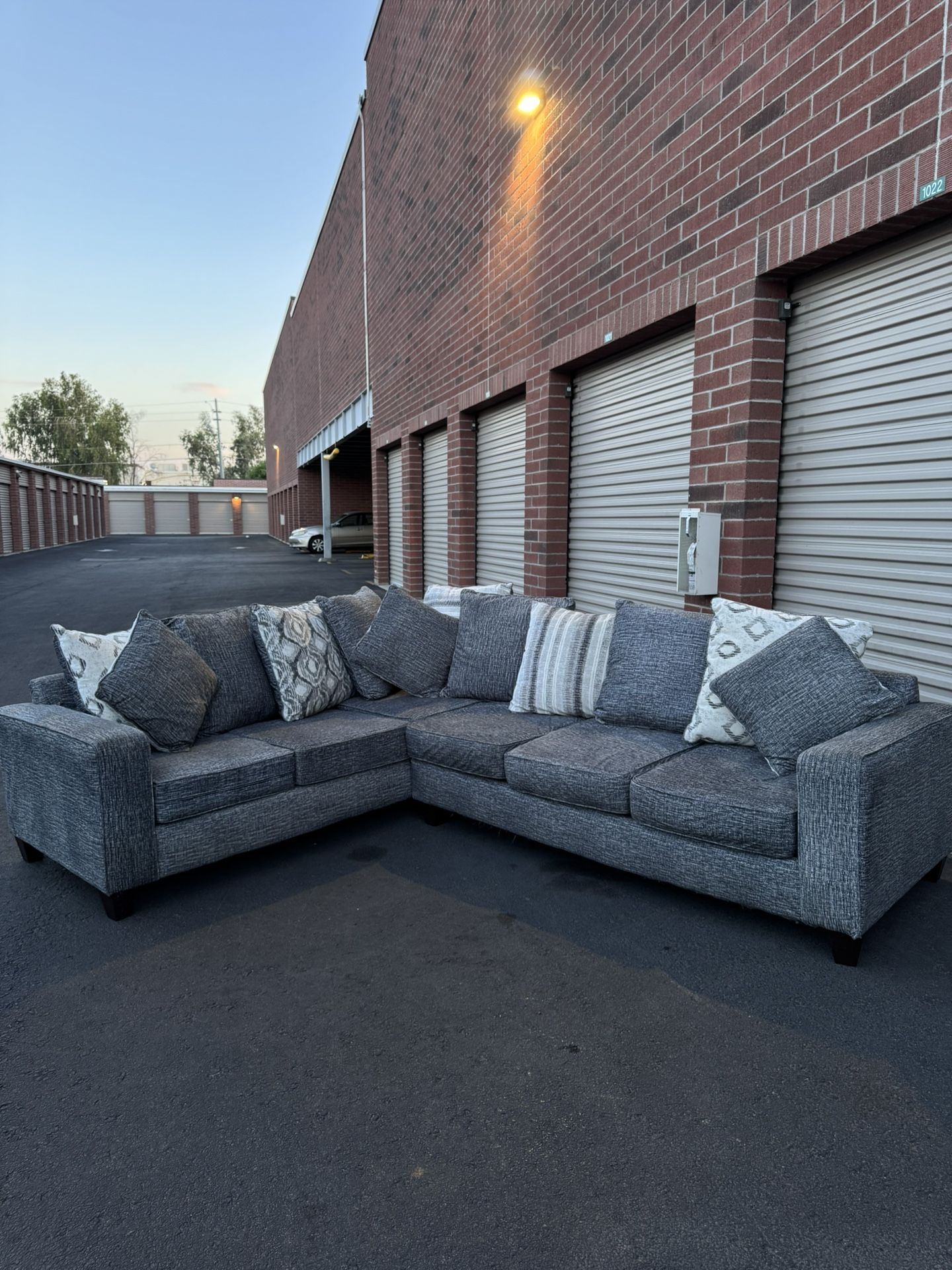 Really nice great IKEA sectional couch with decorative pillows