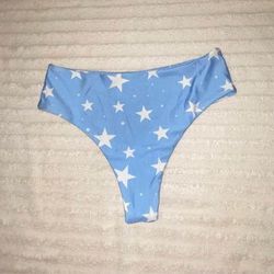 Light blue and white star pattern. Size medium, high cut, swimming suit bottoms. non contact Pickup