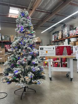 Home Accents 7.5 ft. Festive Flocked Pine LED Pre-Lit