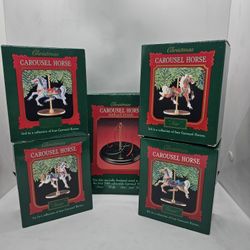 LOT Hallmark CAROUSEL HORSE Christmas 4 Ornament 1989 vintage Set Stand Display

Vintage 1989 Hallmark set includes:
4 carousel horses: Snow - Holly -