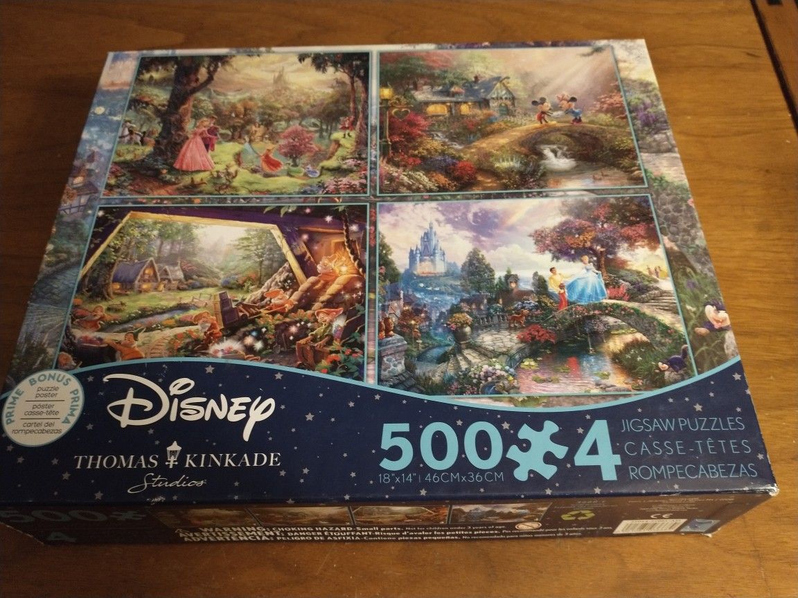 Disney 4 Thomas Kinkade 500 piece puzzles (sleeping beauty, Cinderella, snow white & Mickey and Minnie)
Box is open but puzzles are still new in seale