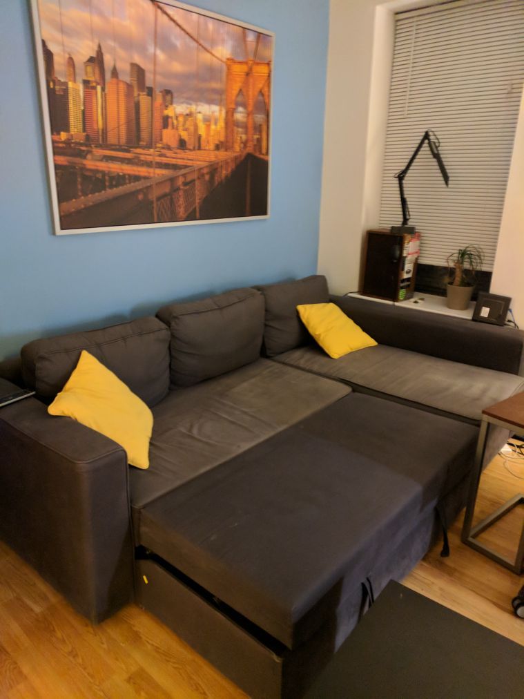 Sofa bed + 2 yellow cushions