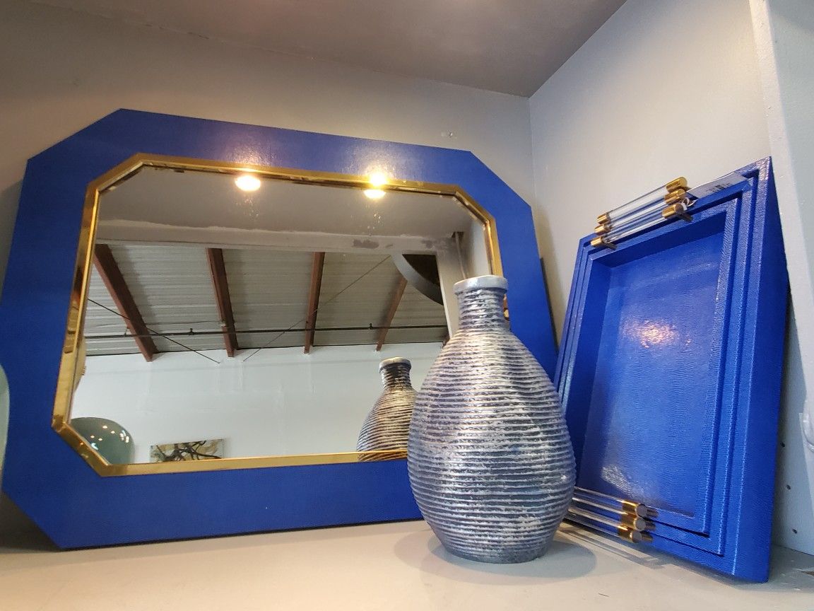 Blue wall mirror, blue trays