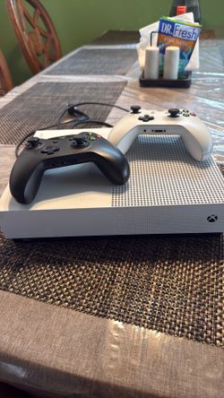 Xbox one s digital  Two controllers