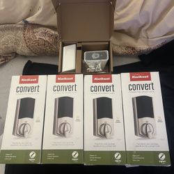 4 KWIKSET CONVERT SMART LOCKS WITH ZIGBEE 3.0. UPC:99140-139. & 1 XFINITY INDOOR/OUTDOOR CAMERA EVERYTHING NEW!!!!