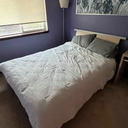 Queen bed with mattress and desk