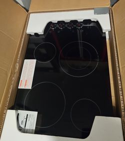 FRIGIDAIRE BLACK ELECTRIC COOKTOP....30 IN....NEW....$ 300