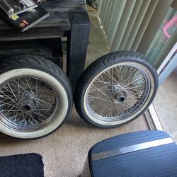  16 inch rear Harley wheel and tire and 19 inch front wheel and tire