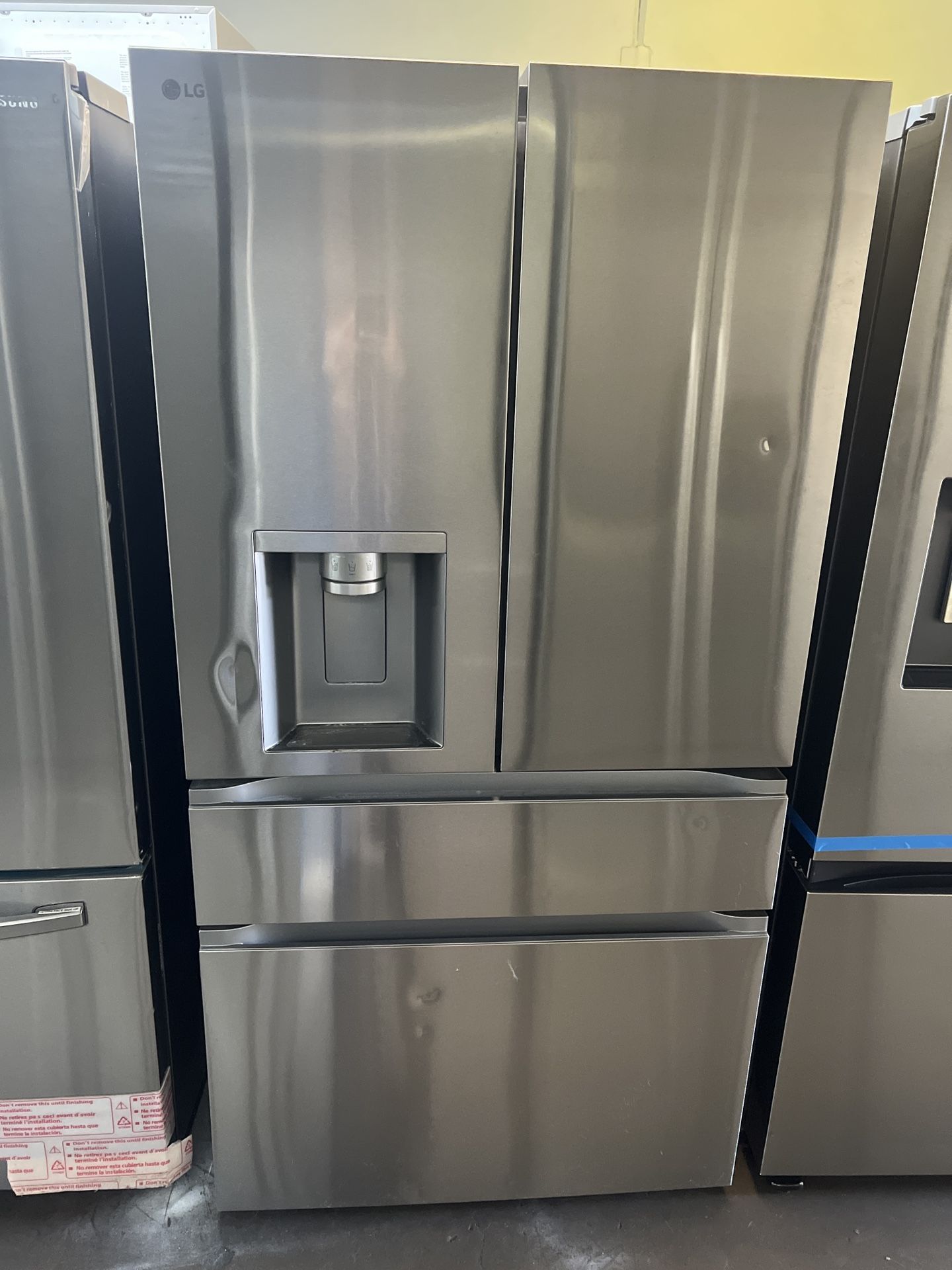 LG FOUR DOOR REFRIGERATOR STAINLESS STEEL