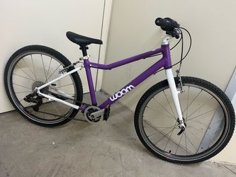 Woom 5 purple 24 inch bike