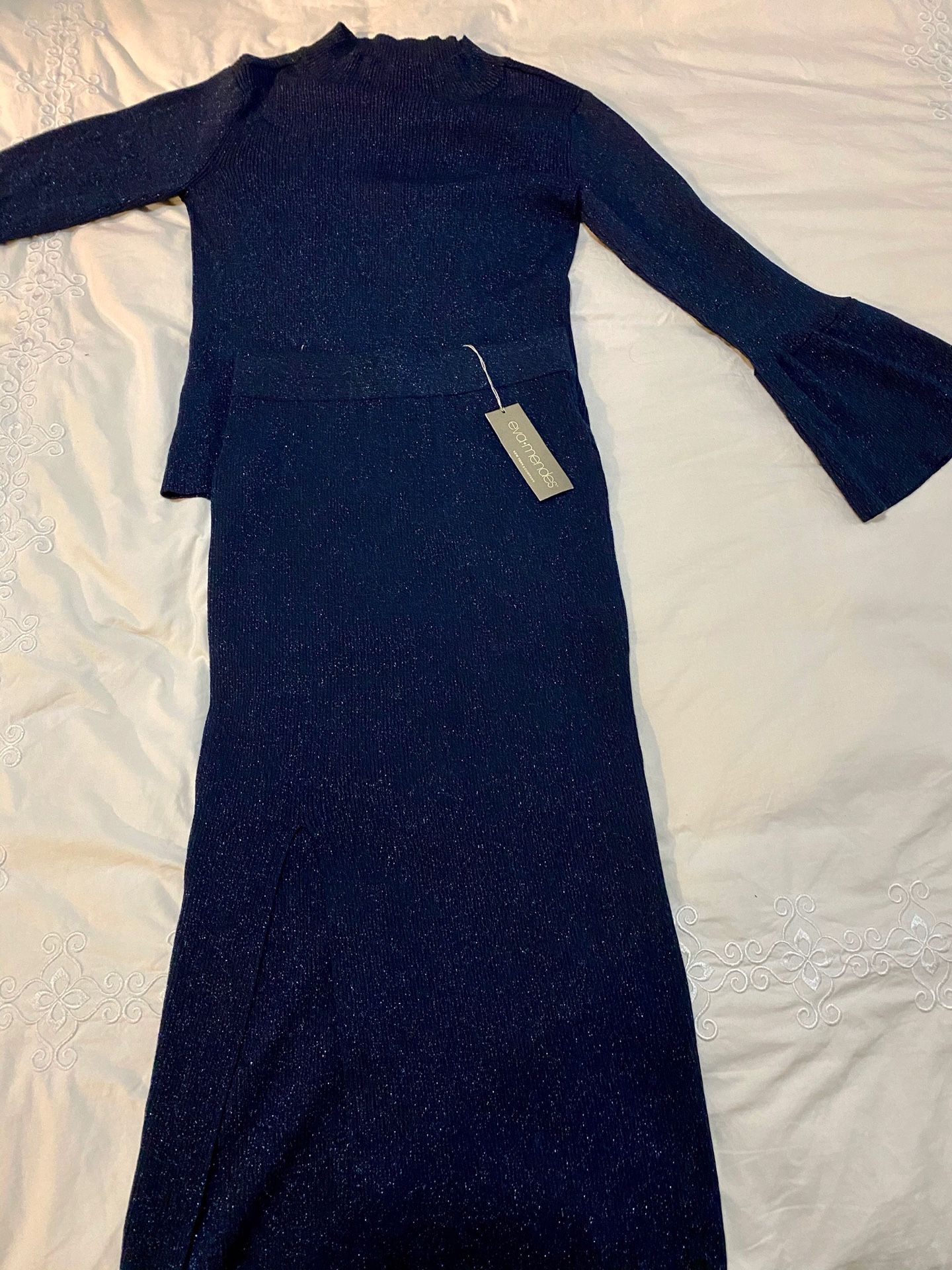 New with tags! Eva Mendez Sweater and skirt. Navy blue with a slight sparkle.