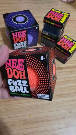 New Authentic Orange Fuzz Ball