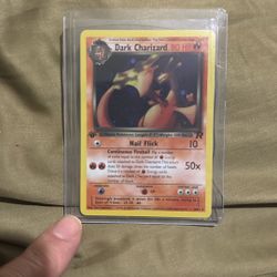 First edition, dark Charizard, looking to Trade let me know what you have