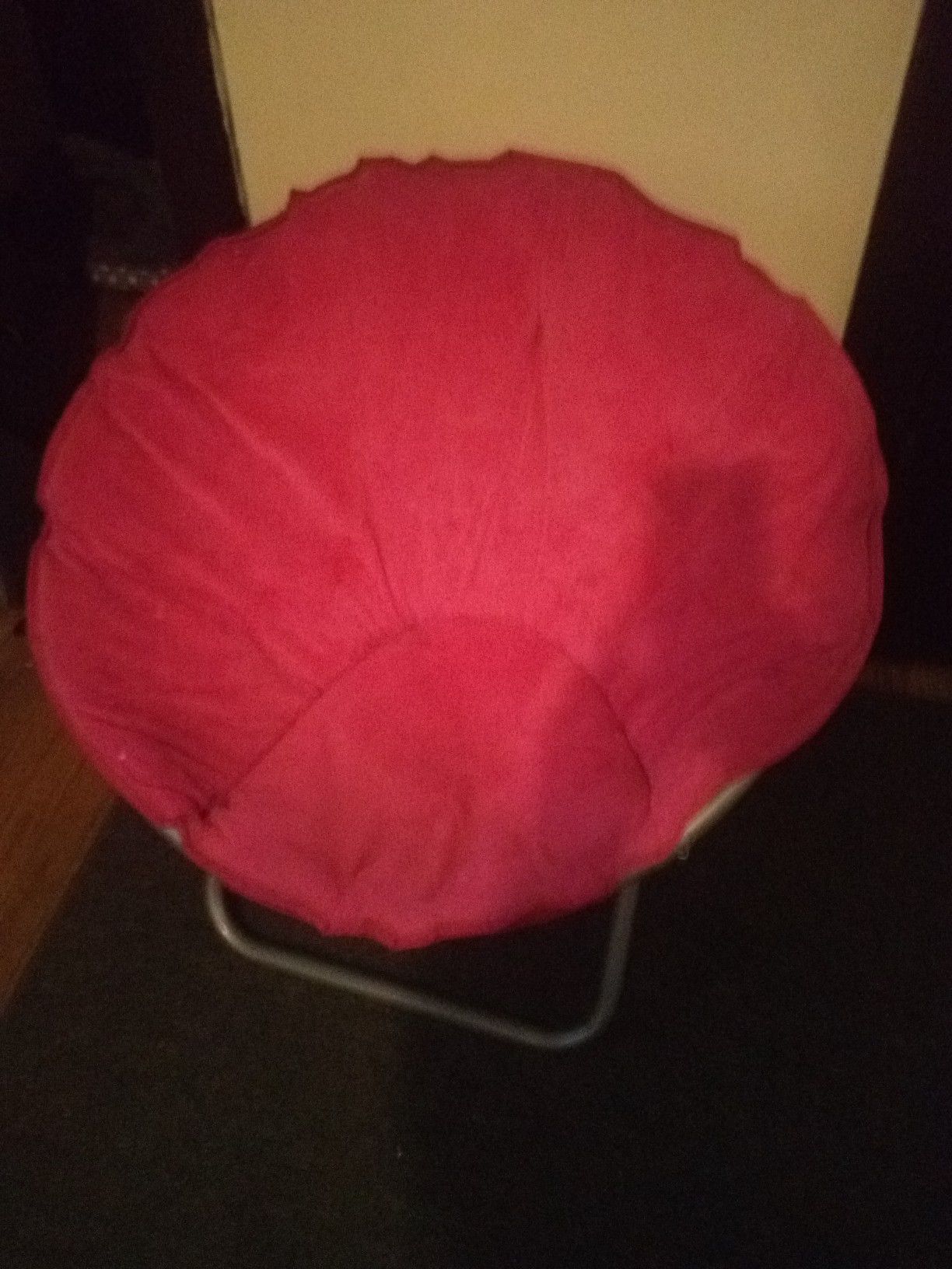 A pink foldable Moon chair