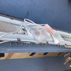 New Light With Hardware Has Chains For Hanging 