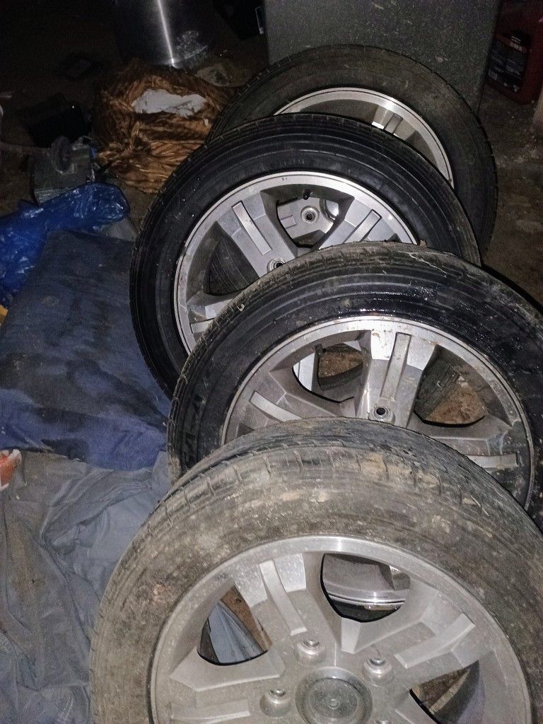 4 Aluminum Kia Rims And 2 Mazda Plus Misc Parts