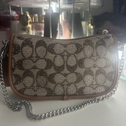Swinger 20 in crystal signature jacquard coach crystal bag