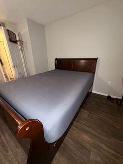 Queen sized bed and frame