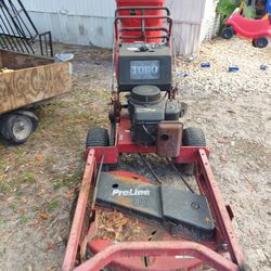 37 Inch Toro Walk Behind With 2 Sulkys And Extra Blades 