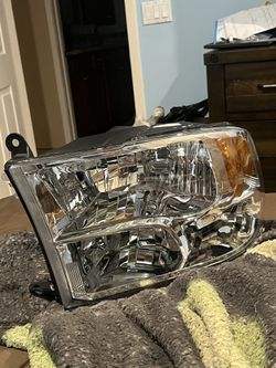 09-18 ram driver headlight 