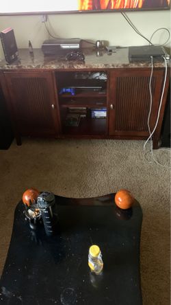 Tv stand and storage,”60” sharp smart tv comes with remote and a Visio sound bar..beautiful tv...”. $600 for everything package deal...will deliver i