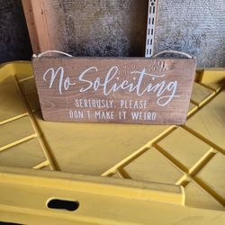 No solicit in sign made out of wood