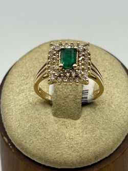 14k yellow gold, diamond and Emerald rings
