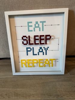 Eat Sleep Play Repeat Framed Wall Art