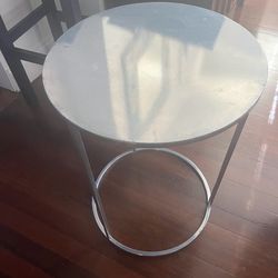 Two modern lightweight aluminum side tables