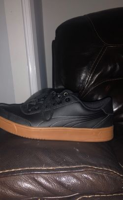 Black leather pumas men’s size 9