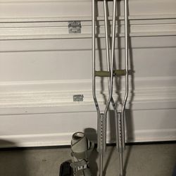 Crutches With Arthritis Shoe And Height Balanced Shoe Other side.