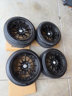 Enkei NT03 18x9.5+40 offset 5x114.3 wrapped in Pirelli 245/18/45