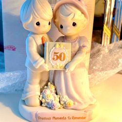  beautiful Precious Moments figurine. Depicting a lovely couple celebrating 50 years of love a