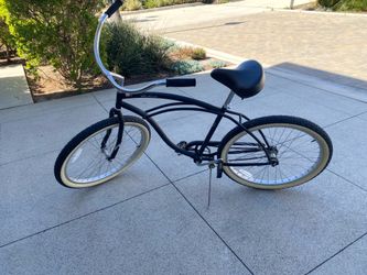 Black Firmstrong beach cruiser bike. 26”