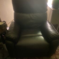 Extra large, swivel/rocker/fake leather recliner brand new
