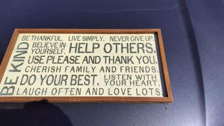 wooden framed wall art sign