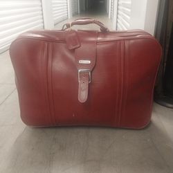 Vintage World Traveler burgandy red suitcase