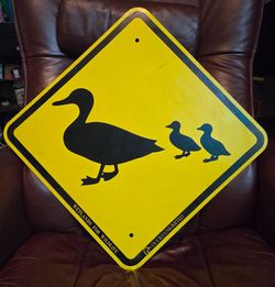 Duck crossing metal sign