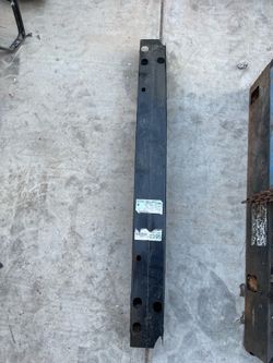 Rear bumper impact bar
