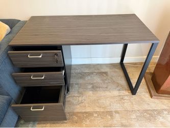 Sturdy Modern 3 Drawer Gray office Desk with black bungee office chair