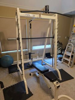 Smith machine with adjustable  bench