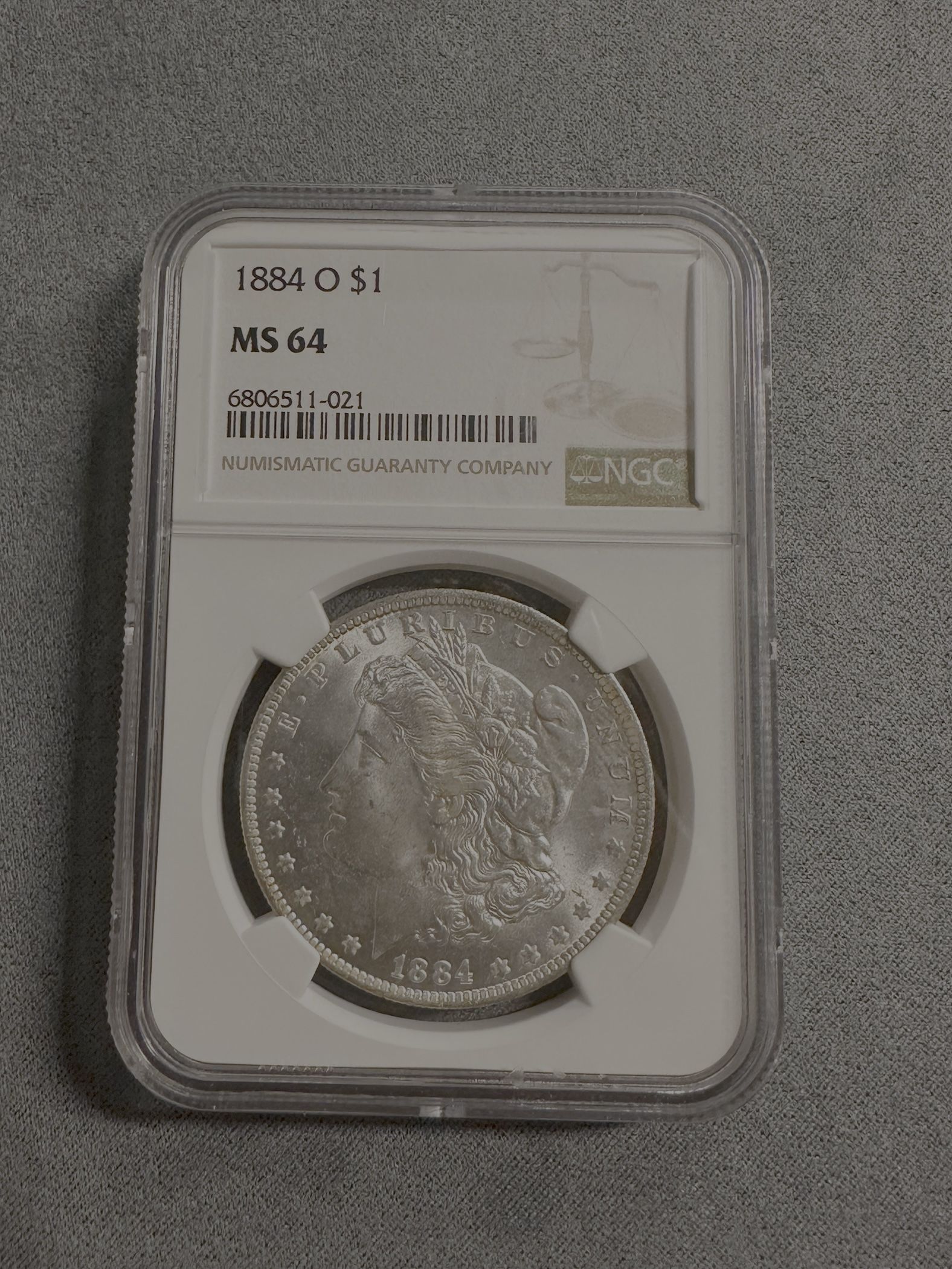 1884-O Morgan Silver Dollar $1 (MS64 NGC Standard Brown)