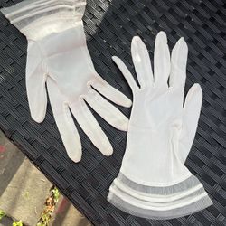 Pretty vintage white gloves with sheer rest