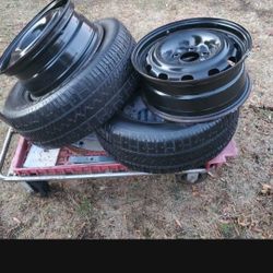 Two Used  16" Snow  Tires  