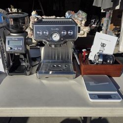 Breville Infuser Espresso Machine, a Breville Smart Grinder Pro coffee grinder and Taylor food scale