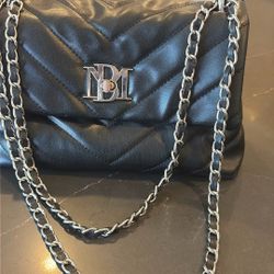 $25.00. Baffled Mischa Black crossbody bag