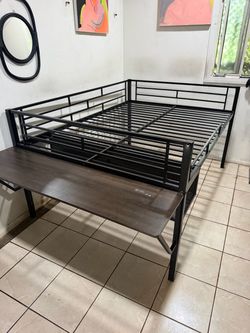 Loft style bed with built in desk
