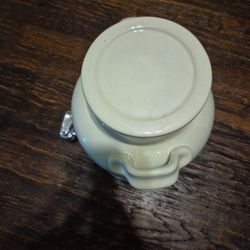 5-gallon ceramic water dispenser with tap, classic design.