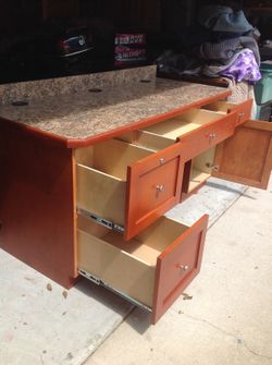 Cherrywood desk with two filing drawers a cupboard and two further drawers in great condition
